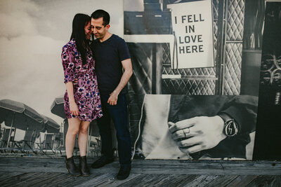 Quirky Couple in Asbury NJ posing for their Engagement Photos