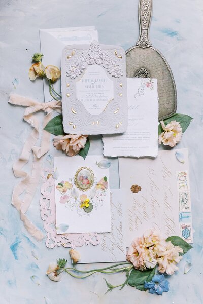 Antique flat lay with stamps and small mirror