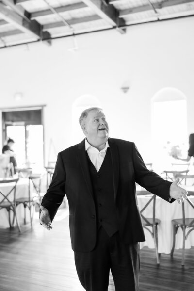 A father sees his bride for the first time on her wedding day at Sterling Event Venue