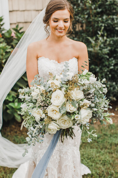 Wedding Photographer & Elopement Photographer,  bride holding large bouquet