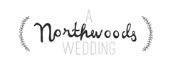 Log with text "A Northwoods Wedding"
