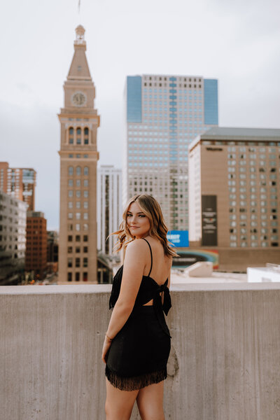 senior girl downtown denver parking garage rooftop photoshoot