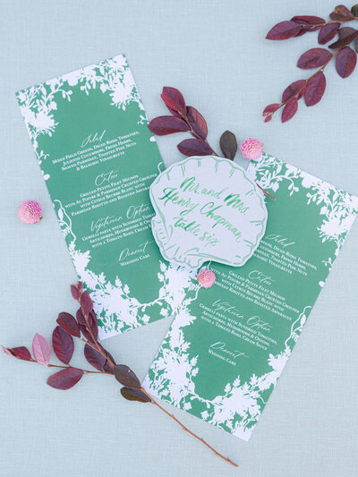 Flatlay of wedding invitations for santa rosa beach wedding