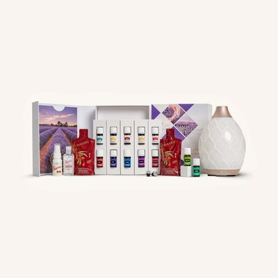 Two bottles of Primally Pure Citrus + Vanilla deodorant on a gray surface