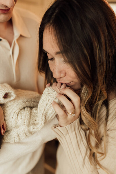 photo of a pregnant woman in white shirt and jeans