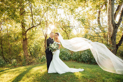 Hamilton Manor | Bride and groom with flowing veil during wedding portrait | New Jersey