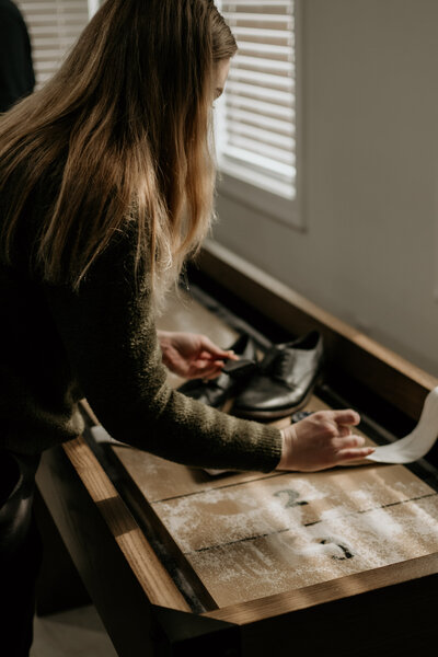 northern california wedding photographer setting up a flatlay