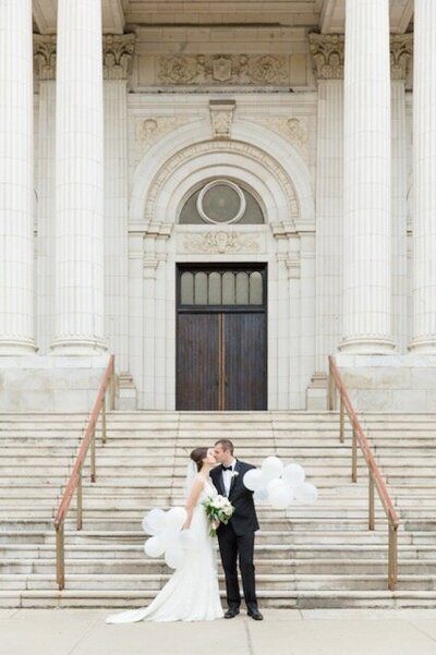 couple posing for wedding photo in winter
