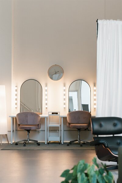 Styled seating area in the Studio by Pepper June with light-filled arches and windows in Castle Hill, Sydney's Hills District