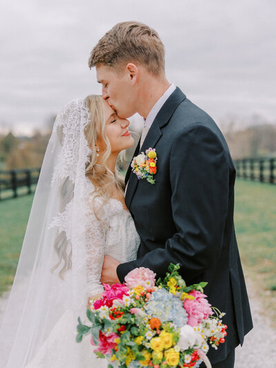 Bride and groom walk up memorial steps at their DC wedding
