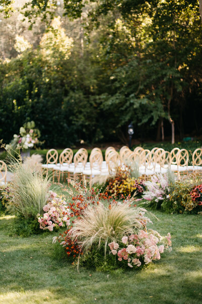 the madrona lawn filled with florals for a wedding