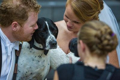 Behind the scenes with bride and groom and their dog at a wedding in Philadelphia