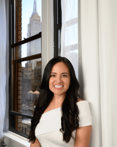Latina Hispanic woman smiling in her professional headshot