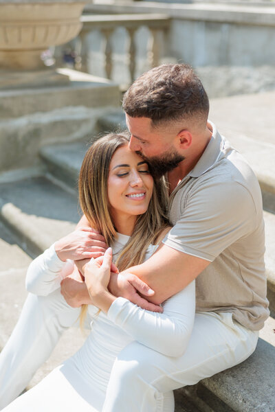 Bride leading groom engagement shoot