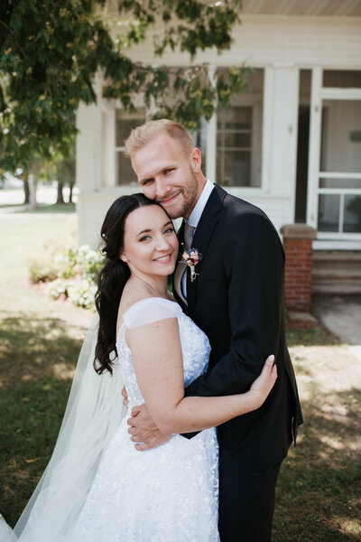 photos of bride and groom during outdoor wedding