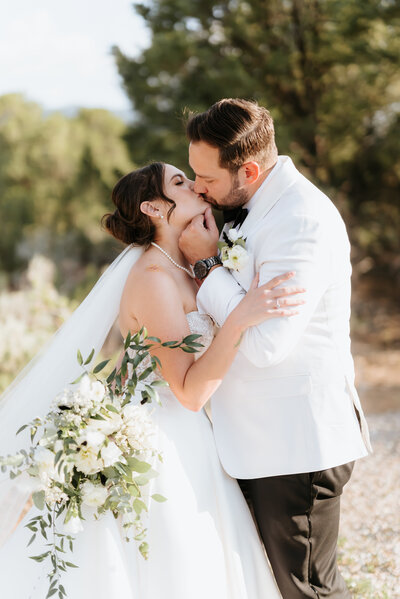 Bride and groom embracing