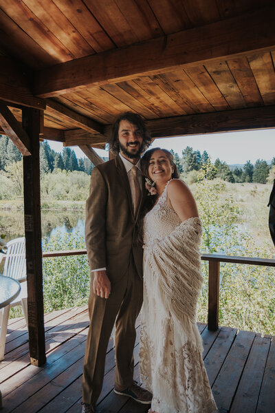 Couple smiles after their first look in McCloud, California.