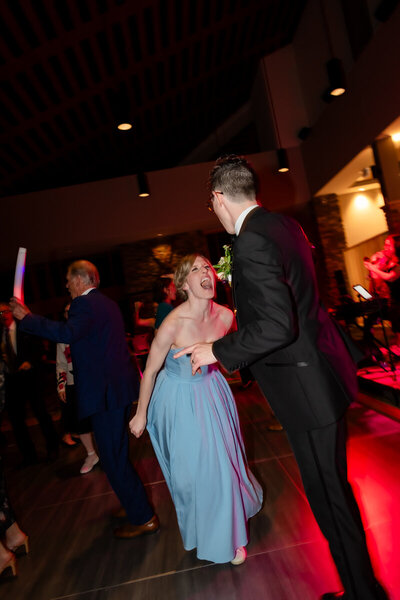 bride changes into cocktail dress for reception