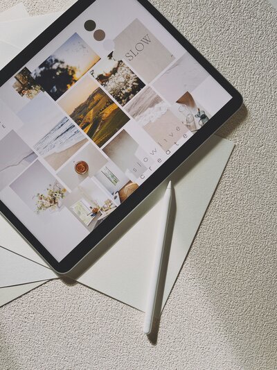 A tablet displaying an email campaign layout on a beige background.