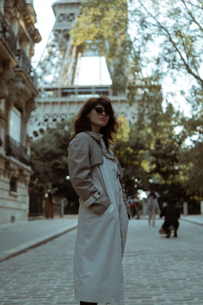 Empowered stylish woman in Paris, France at Eiffel Tower