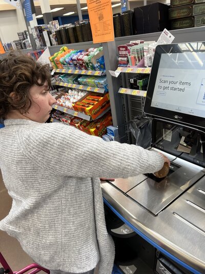 Image of solid rock friend at self checkout.