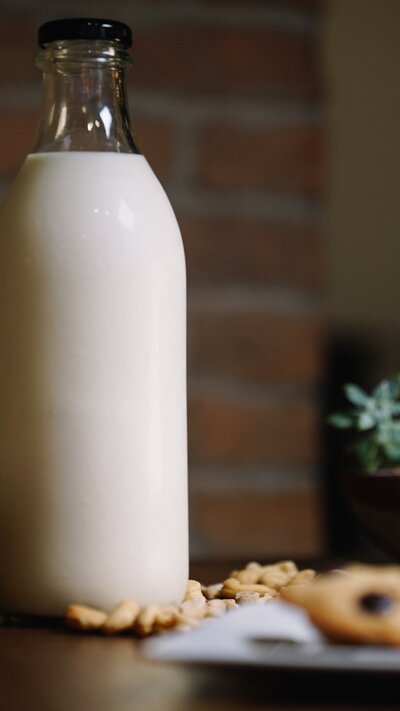 a full glass bottle of milk