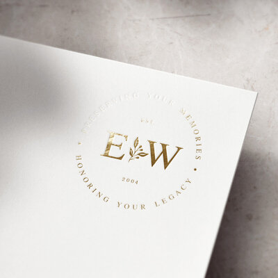 logo monogram design in gold foil for luxury wedding videographer