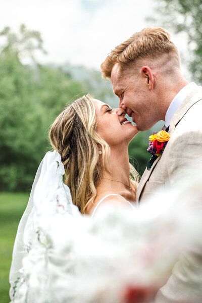 fun and joyful lesbian wedding ceremony at Waterville Valley Resort By Lisa Smith Photography
