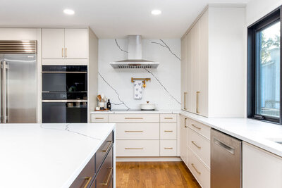 Custom kitchen design featuring semi-custom cabinetry, curated materials, and functional space planning.