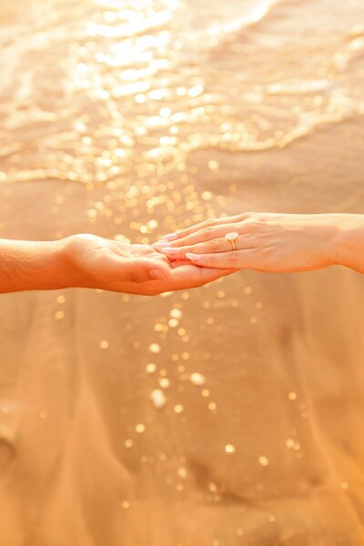 hawaii proposal photographed by love and water at sunset in makena
