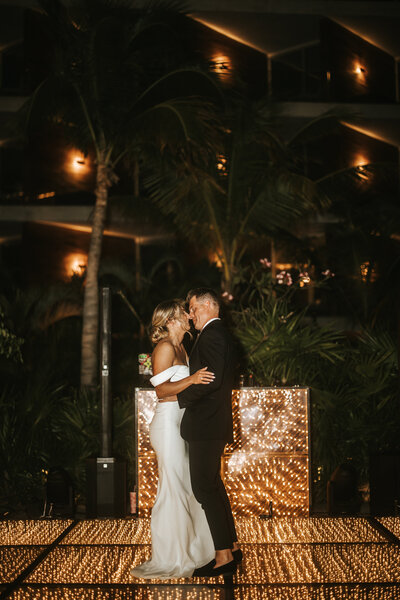 couple kissing during wedding of north georgia