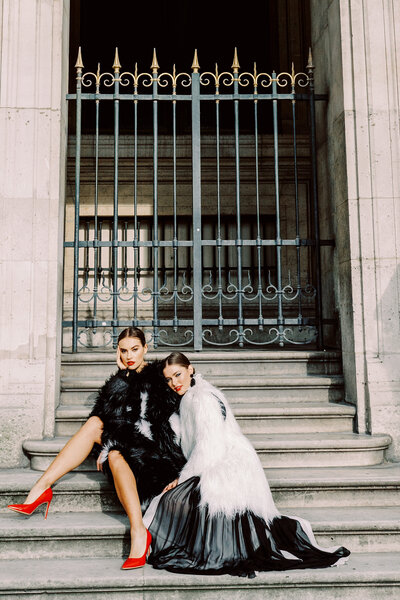 Faux black and white furs with red pumps photographed in Paris by Paris photographer Amy Mulder Photography