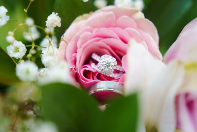 Amanda's engagement ring and wedding band placed in her bouquet at her wedding celebration to Sammy in Wooster, Ohio.