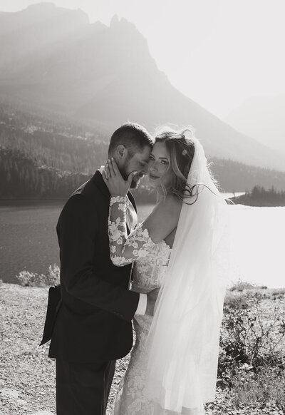 Couple embracing in warm golden hour light during their Georgia couples session.