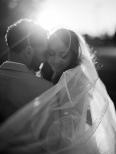 black and white bride and groom at golden hour
