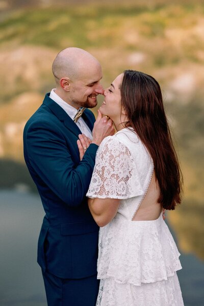 Bride and groom kiss during Brainard Lake elopement.