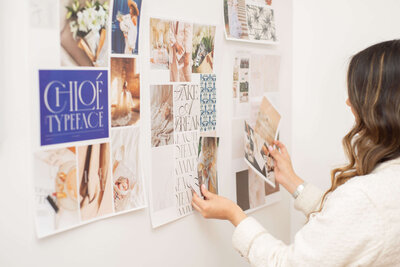 Brand strategist sketching ideas during a custom brand design session for creatives.

