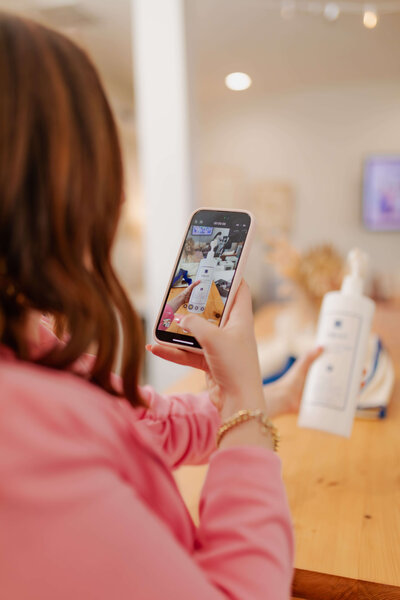 Young woman holding cellphone