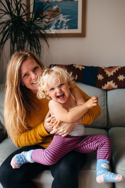 Emma Latham and her daughter at home in Plymouth, Devon 