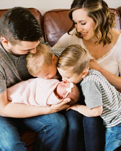 new family of five adoring. baby sister By Carrie Pellerin