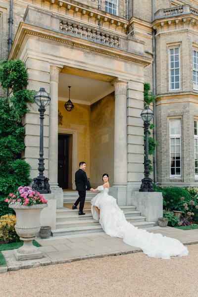 Bride and groom walk up memorial steps at their DC wedding