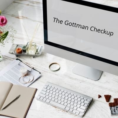 A closeup of a screen with the text "The Gottman Checkup". This checkup is one of the tools used in couples therapy and marriage counseling in FL. Contact a couples therapist for support with online couples counseling and other services.
