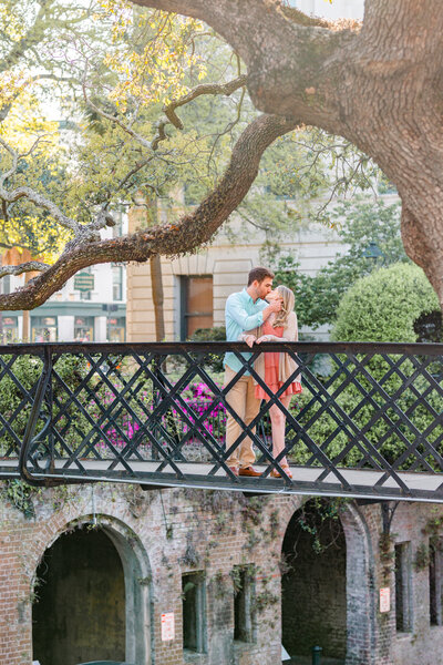 Couple Shares a Kiss on River Street Bridge