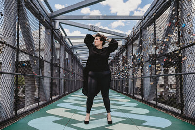Photographer Jessica Lea in a strong pose on Jacksonville lock bridge