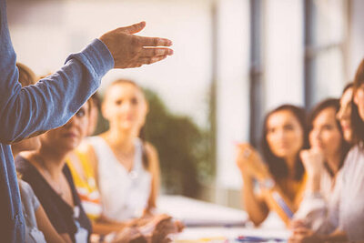 Person coaching a group women