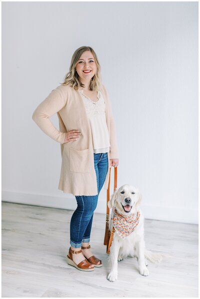 Montana brand photographer Kat's Eye On Design Photography standing with golden retriever