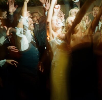 wedding guests dancing taken by wedding photographer tampa fl Noble Photo Co