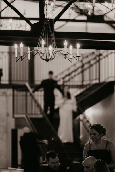 bride and groom grand stair case