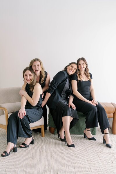Team members laughing and smiling