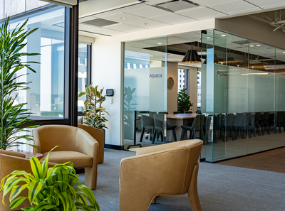Lounge area outside of glass conference room